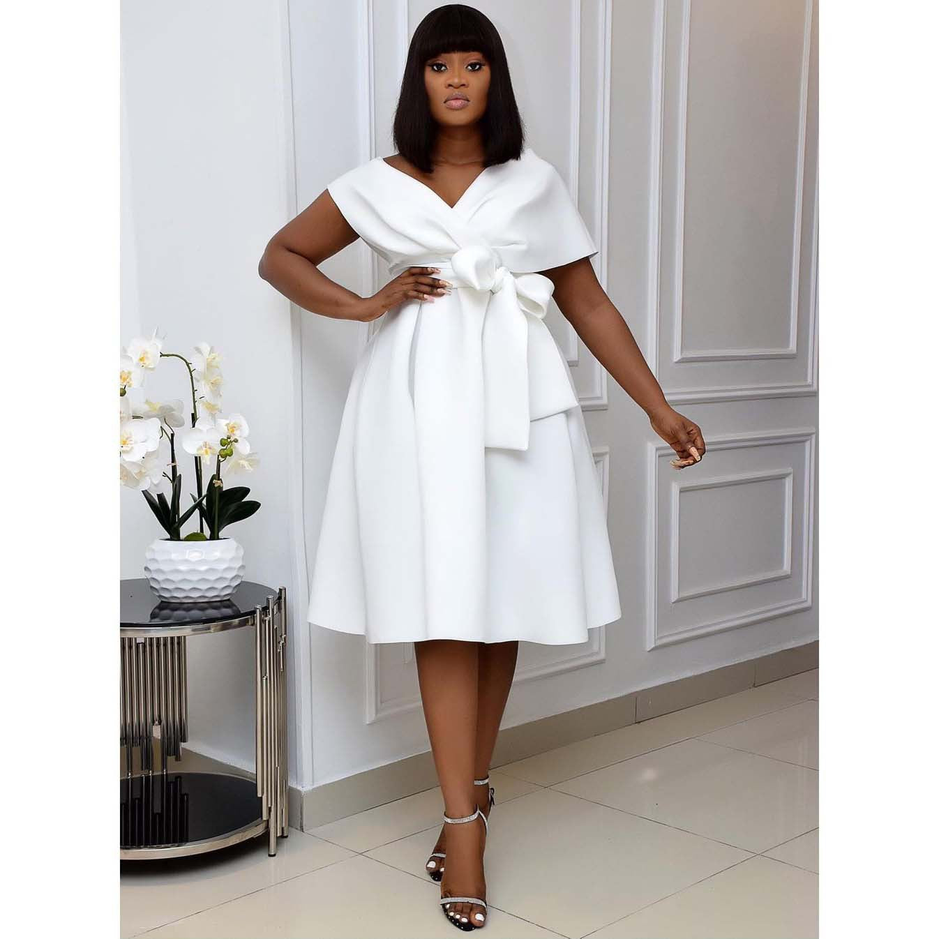 Agathe - Robe midi blanche à nœud élégant