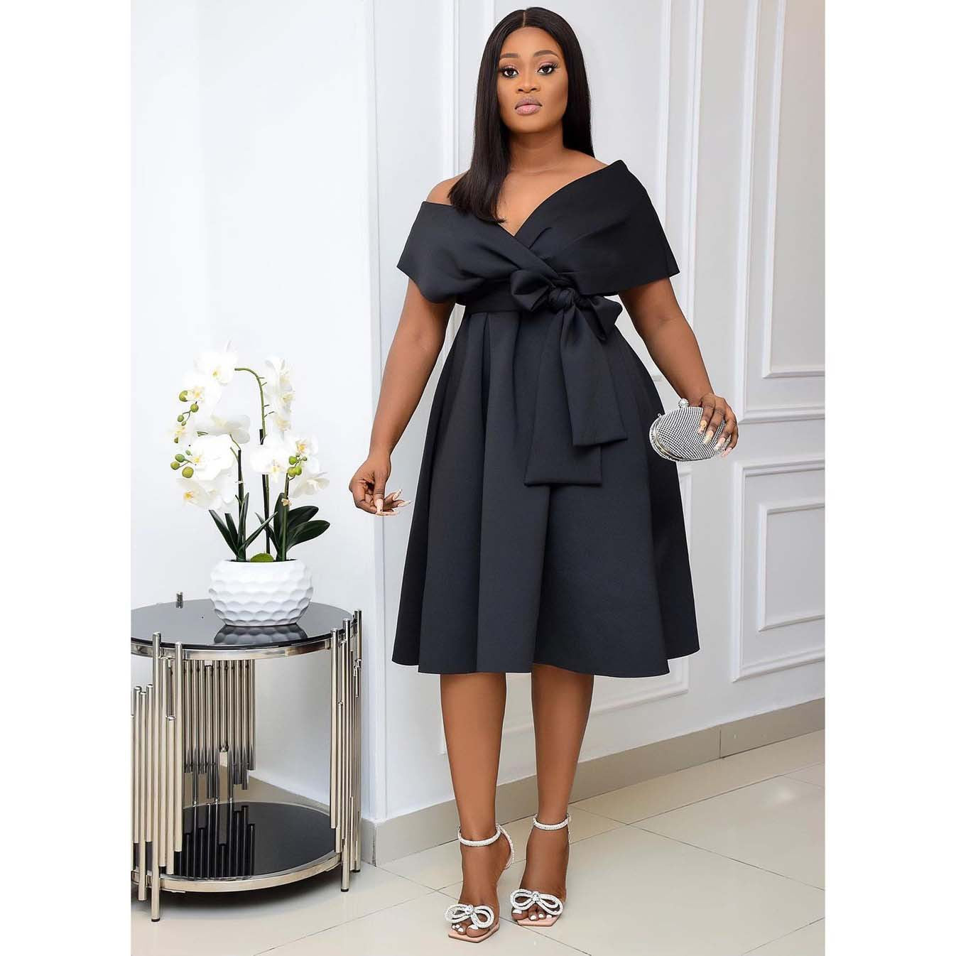 Agathe - Robe midi blanche à nœud élégant