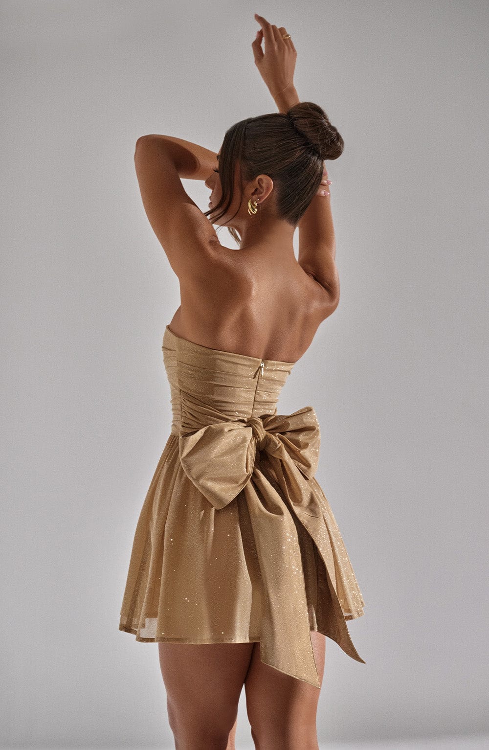 Nora - Robe bustier courte à paillettes dorées