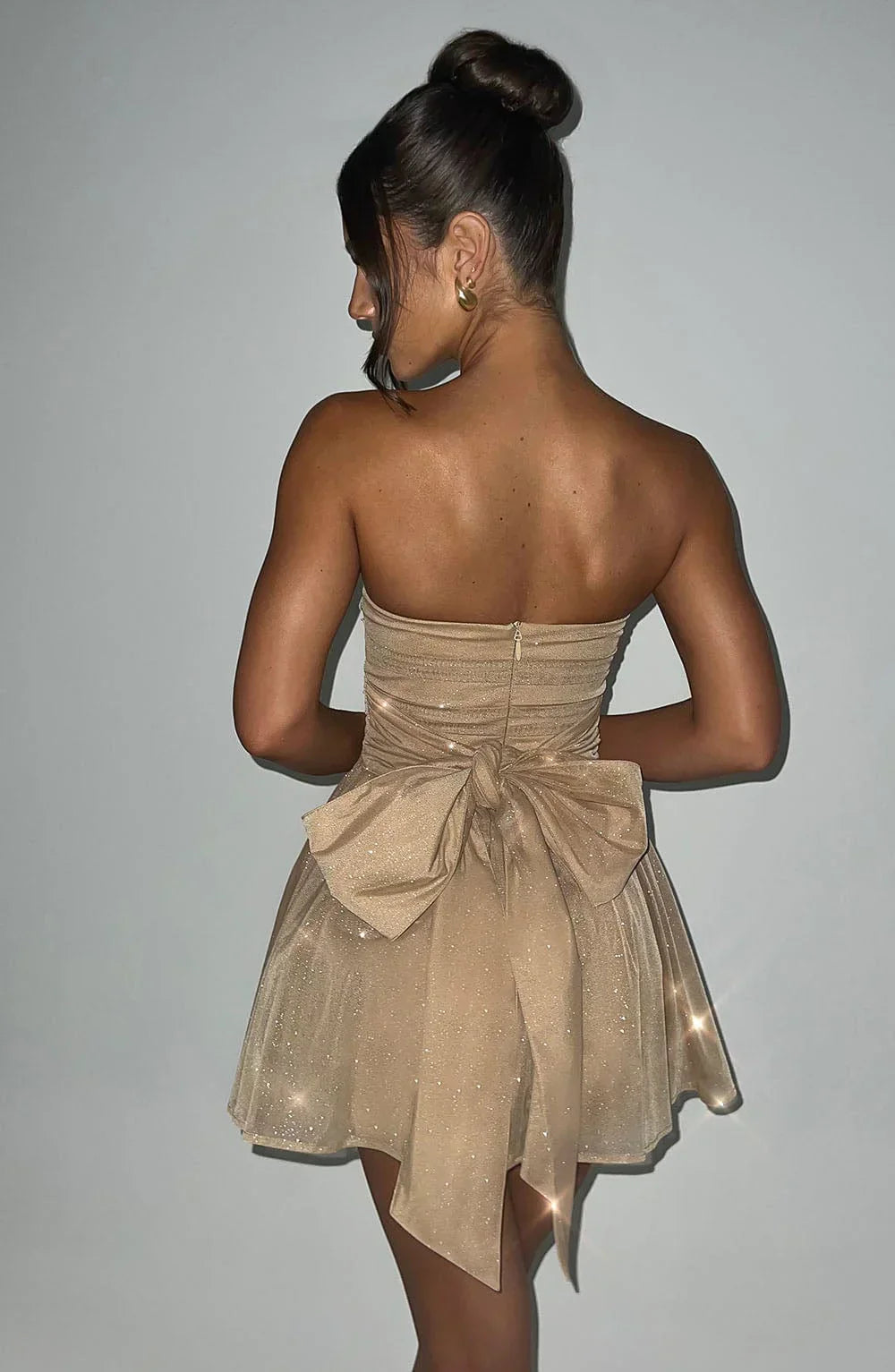 Nora - Robe bustier courte à paillettes dorées